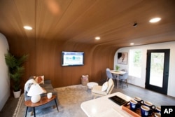 The inside of the University of Maine's first 3D printed home is visible on Oct. 12, 2023, in Orono, Maine. (AP Photo/Kevin Bennett)