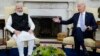 FILE - U.S. President Joe Biden meets with India Prime Minister Narendra Modi in the Oval Office of the White House in Washington, Sept. 24, 2021. Biden is honoring Modi with a state visit this week. Modi arrives in the U.S. on Wednesday,