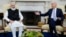 FILE - U.S. President Joe Biden meets with India Prime Minister Narendra Modi in the Oval Office of the White House in Washington, Sept. 24, 2021. Biden is honoring Modi with a state visit this week. Modi arrives in the U.S. on Wednesday,