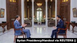 Dîmenek ji hevpeyvîna Serokê Sûrîyê Beşar Esed ligel Sky New Arabia.