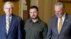 Ukrainian President Volodymyr Zelenskyy, center, walks with Senate Minority Leader Mitch McConnell, left, and Senate Majority Leader Chuck Schumer on Capitol Hill in Washington, Sept. 21, 2023.