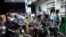 People wait for their turn to get fuel at a petrol station, after petrol dealers across the country announced they are going on strike against taxes imposed by the government, in Karachi, Pakistan, July 4, 2024.