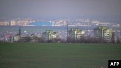 FILE - A photo shows Tiraspol in the background of Moldova's Transnistria breakaway region, March 1, 2024.