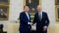President Joe Biden shakes hands with South Korea's President Yoon Suk Yeol as they meet in the Oval Office of the White House, in Washington, April 26, 2023. 