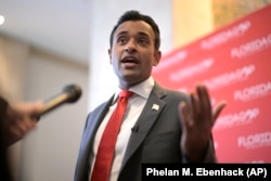 FILE - Republican presidential candidate Vivek Ramaswamy answers questions from reporters on Nov. 4, 2023, in Kissimmee, Fla. (AP Photo/Phelan M. Ebenhack, File)