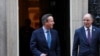 Britain's former Prime Minister and newly appointed Foreign Secretary David Cameron walks outside 10 Downing Street next to top civil servant in the Foreign Office Philip Barton, in London, Britain, Nov. 13, 2023. 