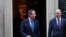 Britain's former Prime Minister and newly appointed Foreign Secretary David Cameron walks outside 10 Downing Street next to top civil servant in the Foreign Office Philip Barton, in London, Britain, Nov. 13, 2023. 