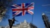 A British flag flutters in Parliament Square in London, March 29, 2019. A researcher in the British parliament was arrested in March 2023 on suspicion of spying for Beijing.