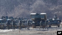 ፎቶ ፋይል፦ የደቡብ ኮሪያ ወታደሮች፣ ሰሜን ኮሪያ ድንበር አቅራቢያ በምትገኘው ፓጁ ወታደራዊ ልምምድ ሲያደርጉ እአአ ጥር/24/2024. 