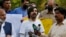 FILE - Pakistani journalist Asad Ali Toor, center, speaks during a demonstration called by a journalists union to condemn attacks on journalists, in Islamabad, May 28, 2021.