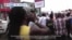 VOA60 Africa- Nigeria: Police fired tear gas to disperse crowds of protesters in the capital city of Abuja on Thursday