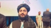 Abdul Bari Omar, head of the Taliban-led food and medicine authority, poses in this undated photo at the 2nd World Local Production Forum in the Hague in November. The photo was posted to the social media platform, X.