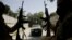 FILE - Taliban fighters patrol in Kabul, Afghanistan, on Aug. 19, 2021. 