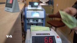 Mûçexarên Duhokê ji Biryara Dadgeha Federal ya Dayîna Mûçeyan bi Rêya Bankê Kêfxweş In