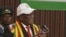Zimbabwe President Emmerson Dambudzo Mnangagwa address ruling ZANU-PF at the party's headquarters in Harare on Aug. 7, 2024. (Columbus Mavhunga/VOA)