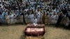 FILE - Relatives and mourners attend the funeral of victims who were killed in a suicide bomber attack in the Bajaur district of Khyber Pakhtunkhwa, Pakistan, July 31, 2023.