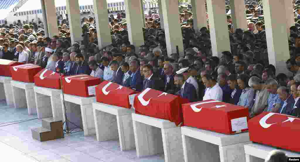 Coffins with victims of the thwarted coup are lined up for a funeral service in Ankara, Turkey.