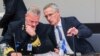 NATO Secretary-General Jens Stoltenberg, right, talks to Chair of the NATO Military Committee, Admiral Rob Bauer during a meeting of NATO defense ministers in the Ukraine Defense Contact Group format at NATO headquarters in Brussels, Oct. 12, 2022. 