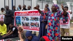 FILE - Relatives of the Kaduna train kidnapped victims protest at the ministry of transport in Abuja, Nigeria, July 25, 2022. Officials said on Oct. 5, 2022, that the hostages had been released. 