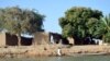 FILE - The village of Blaram on the Logone river is seen during normal water levels, at the Cameroon-Chad border, March 1, 2013. Recent flooding has devastated the region.