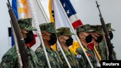 美国、菲律宾、日本和韩国在菲律宾达义市举行联合军演开幕式。（路透社2022年10月3日）