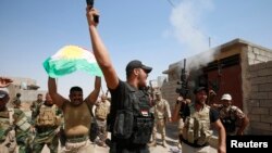 نیروهای مسلح پیشمرگه کرد بازپس گیری سلیمان بیک از شورشیان دولت اسلامی را جشن می گیرند - سلیمان بیک، ۱۰ شهریور