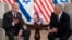 President Joe Biden, left, and Israeli Prime Minister Yair Lapid address the media following their meeting in Jerusalem, July 14, 2022.