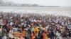 Visitors pack a crowded beach in Mumbai, India, June 12, 2022. The U.N.'s population projection predicts India will overtake China as the world's most populous country by next year. 