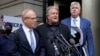 Former White House strategist Steve Bannon, center, speaks with members of the press after departing the federal court, July 18, 2022, in Washington. Standing with Bannon are his attorneys David Schoen, left, and M. Evan Corcoran. 