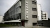This June 27, 2017 photo shows the Bauhaus main building in Dessau, Germany. The Bauhaus World Heritage is to be extended to include the Houses with Balcony Access on the Dessau-Toerten housing estate and the ADGB Trade Union School.