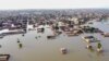 FILE - This aerial view shows a flooded residential area after heavy monsoon rains in Balochistan province of Pakistan, Aug. 29, 2022. 