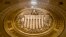 FILE - In this Feb. 5, 2018, photo, the seal of the U.S. Federal Reserve System is displayed in the Federal Reserve Board Building in Washington.
