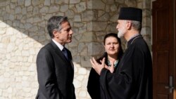 آنتونی بلینکن (چپ)