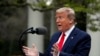 President Donald Trump speaks about the coronavirus in the Rose Garden of the White House, in Washington, April 14, 2020.