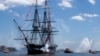 The USS Constitution fires a 21-gun salute in honor of America's 237th birthday during the ship's annual Fourth of July turnaround cruise in Boston Harbor on July 4, 2013. 