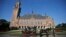 In this Aug. 28, 2013 file photo, a horse-drawn carriage stands in front of the Peace Palace, seat of the International Court of Justice (ICJ) in The Hague, Netherlands.