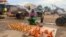 People sell produce in Zimbabwe in this undated photo. Zimbabwe's economy has mainly turned informal over the years, and authorities attribute that to sanctions imposed by some Western nations following reports of election rigging and human rights abuses. (Columbus Mavhunga/VOA)