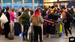 美国空管系统电脑故障一度造成西南航空公司在芝加哥机场的乘客滞留。（2023年1月11日）