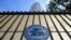 FILE - The logo of the Reserve Bank of India (RBI) is pictured on the gate of the bank's head office in Mumbai, Nov. 17, 2021.
