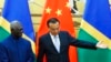 FILE - Solomon Islands Prime Minister Manasseh Sogavare, left, and Chinese Premier Li Keqiang attend a signing ceremony at the Great Hall of the People in Beijing, Oct. 9, 2019.