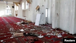 Debris is seen inside a mosque after a blast in Kabul, Afghanistan, May 24, 2019.