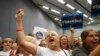 Supporters at a Take It Back California event where former President Barack Obama campaigns in in support of California congressional candidates, Sept. 8, 2018, in Anaheim, Calif. 