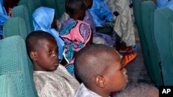 FILE - In this Aug. 27, 2021, photo, some freed students of the Salihu Tanko Islamic School, before a meeting with Niger state governor in Minna, Nigeria. 