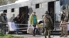 Azovstal steel plant employee Natalia Usmanova, 37, who was evacuated from Mariupol, arrives at a temporary accommodation centre during Ukraine-Russia conflict in the village of Bezimenne in the Donetsk Region, May 1, 2022. 
