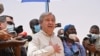 FILE - United Nations (UN) Secretary-General Antonio Guterres (C) delivers a speech at an internally displaced persons (IDP) camp in Ouallam, Niger, on May 3, 2022 during his visit to the country.