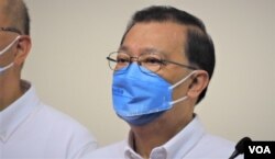 李家超竞选办主任、中国全国人大常委谭耀宗表示，会视不支持票和白票为压力及鞭策，努力做得更好 (美国之音/汤惠芸)