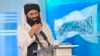 FILE - Taliban Interior Minister Sirajuddin Haqqani, speaking in Kabul on April 28, 2022, still carries a $10 million bounty from the U.S. government for his arrest relating to a fatal attack on a hotel in 2008. 