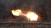 FILE - Ukrainian artillery shells Russian troops' position on the front line near Lysychansk in the Luhansk region, April 12, 2022.