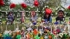 Flowers, toys, and other objects to remember the victims of the deadliest U.S. school mass shooting in nearly a decade, resulting in the death of 19 children and two teachers, are pictured at the Robb Elementary School in Uvalde, Texas, May 30, 2022. 