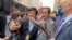 A protester threw a shoe aimed at Cambodia's Prime Minister Hun Sen, during his meet and greet with his supporters in Washington DC, Wednesday, May 11, 2022. 
